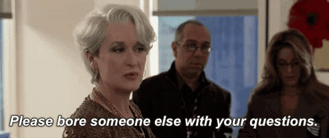 Meryl Streep gif that dismisses people and their questions 
